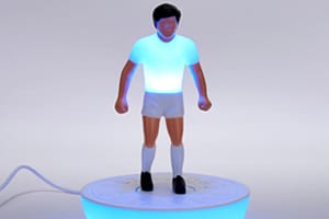 Novelty mood light in the shape of an oversized Subbuteo football player figure.