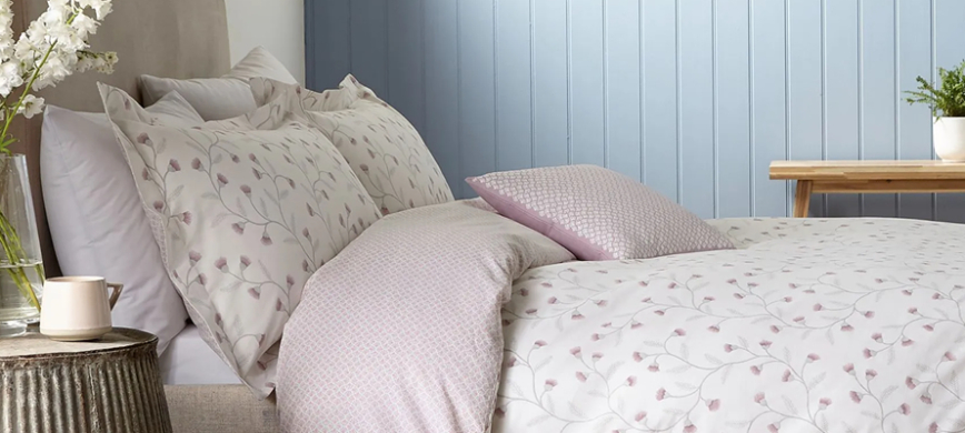 Sanderson Everly Bedding - A traditional trailing floral print in a heather colourway, set against a white background.
