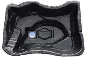 Large black plastic pre-moulded wildlife pond casing. Roughly rectangular in shape, featuring shallow and deeper areas, with a small stepped area on one side to allow animals easier access or escape.