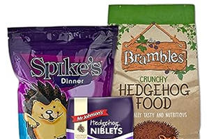 Various packets of animal feed, designed specifically for hedgehogs