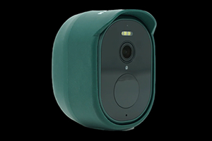 A sleek, modern looking oval wildlife camera with a dark green protective casing.